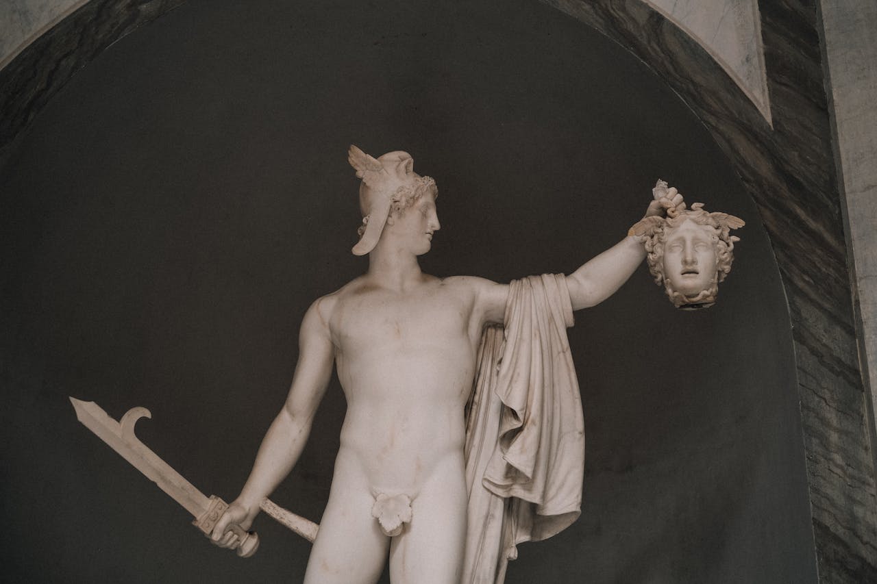 Marble sculpture of Perseus with Medusa's head in Vatican Museum, Rome.